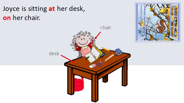 Joyce is sitting at her desk